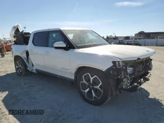 2024 Rivian R1T Adventure z VIN 7FCTGCAA9RN030318, wystawiony jako Copart lot #77036474 z przebiegiem 3 522 mil mil oraz Szkoda całkowita • Salvage title. Historia ofert i sprzedaży dostępna na DreamBid. Obrazek 4.