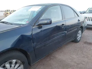 2004 Toyota Camry LE with VIN 4T1BE32K54U260916, listed as a IAAI auction lot 42052542 with 260,721 mi miles and . Bid and sale history available at carsss.com. Image 12.