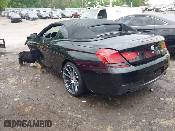 2014 BMW 6 Series 640i z VIN WBALW7C5XED595934, wystawiony jako IAAI lot #42092380 z przebiegiem Nie podano mil oraz . Historia ofert i sprzedaży dostępna na DreamBid. Obrazek 3.
