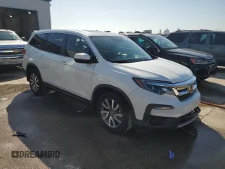 2021 Honda Pilot EX-L with VIN 5FNYF5H54MB045464, listed as a Copart auction lot 63412425 with 60,666 mi miles and Salvage title. Bid and sale history available at DreamBid. Image 4.