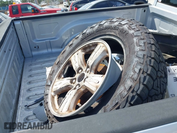 2014 Ram 1500 SLT z VIN 1C6RR6GT9ES477819, wystawiony jako IAAI lot #42358824 z przebiegiem 145 044 mil mil oraz . Historia ofert i sprzedaży dostępna na DreamBid. Obrazek 12.