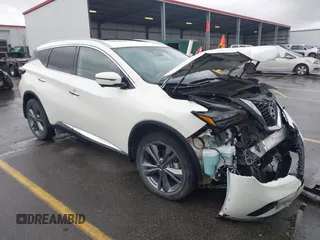 2023 Nissan Murano Platinum z VIN 5N1AZ2DJ9PC115757, wystawiony jako IAAI lot #41972876 z przebiegiem 42 617 mil mil oraz . Historia ofert i sprzedaży dostępna na DreamBid. Obrazek 1.