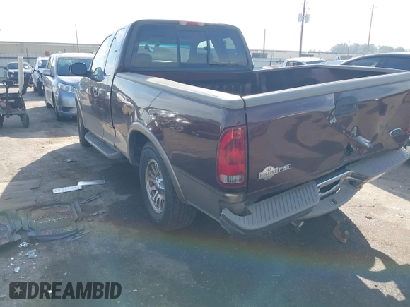 2002 Ford F-150 XL with VIN 1FTRX17L82KB68307, listed as a IAAI auction lot 40642958 with 115,737 mi miles. Bid and sale history available at carsss.com. Image 3.