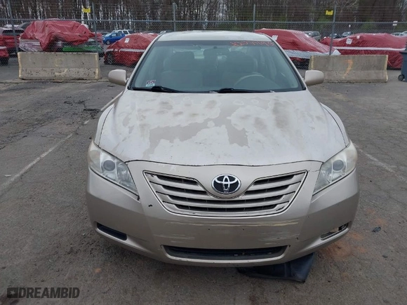2007 Toyota Camry CE with VIN 4T1BE46K07U700447, listed as a IAAI auction lot 42085195 with 254,770 mi miles. Bid and sale history available at carsss.com. Image 6.