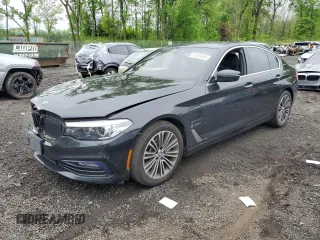 2018 BMW 5 Series 530e xDrive with VIN WBAJB1C55JB085156, listed as a Copart auction lot 57105205 with 44,294 mi miles and Salvage title. Bid and sale history available at DreamBid. Image 1.