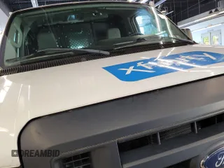 2013 Ford Econoline Cargo Commercial with VIN 1FTNE2EL1DDB26372, listed as a IAAI auction lot 42787142 with 117,378 mi miles and . Bid and sale history available at DreamBid. Image 9.