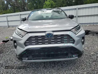 2021 Toyota RAV4 Hybrid XSE with VIN 2T3E6RFVXMW020561, listed as a Copart auction lot 64822005 with 39,434 mi miles and Salvage title. Bid and sale history available at DreamBid. Image 5.