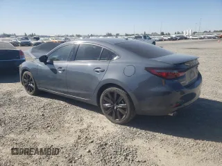 2021 Mazda 6 Grand Touring Reserve with VIN JM1GL1WY1M1617013, listed as a Copart auction lot 76836264 with 38,484 mi miles and Salvage Title. Bid and sale history available at DreamBid. Image 2.