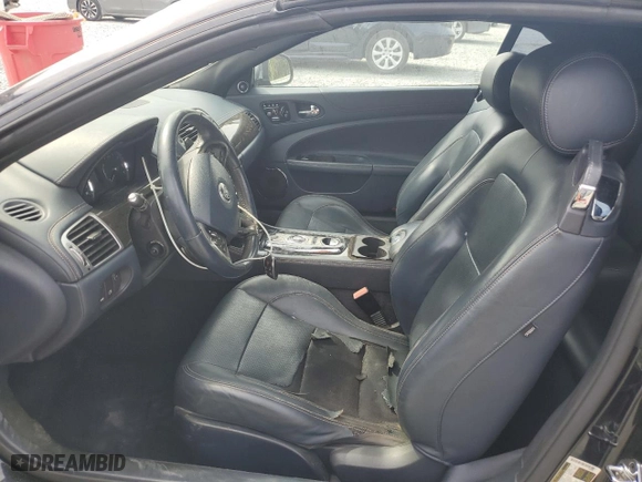 2013 Jaguar XK with VIN SAJWA4GB2DLB49024, listed as a Copart auction lot 72409694 with 67,466 mi miles and Salvage Title. Bid and sale history available at carsss.com. Image 7.