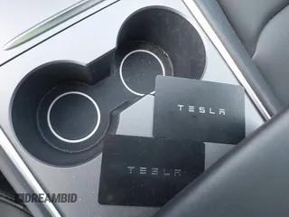 2022 Tesla Model Y Performance with VIN 7SAYGDEF8NF407109, listed as a IAAI auction lot 42014282 with 24,937 mi miles and . Bid and sale history available at DreamBid. Image 11.