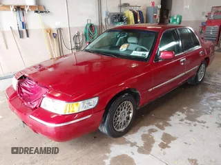 2001 Mercury Grand Marquis GS z VIN 2MEFM74W01X636957, wystawiony jako IAAI lot #42270858 z przebiegiem 181 372 mil mil oraz . Historia ofert i sprzedaży dostępna na DreamBid. Obrazek 2.