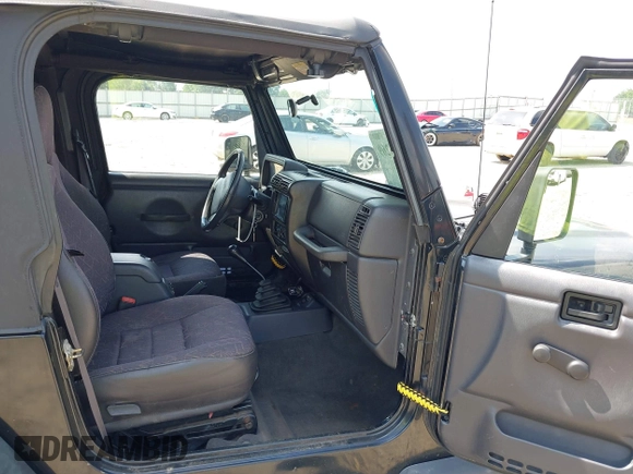 2002 Jeep Wrangler Sport with VIN 1J4FA49S32P700831, listed as a IAAI auction lot 42626269 with 182,870 mi miles and . Bid and sale history available at DreamBid. Image 5.