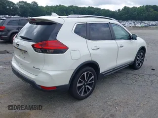 2017 Nissan Rogue SV with VIN 5N1AT2MV5HC812557, listed as a IAAI auction lot 42677622 with 64,686 mi miles and . Bid and sale history available at DreamBid. Image 4.