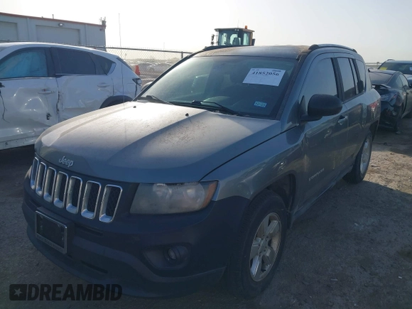 2014 Jeep Compass Sport with VIN 1C4NJCBA6ED620698, listed as a IAAI auction lot 41852056 with 193,085 mi miles and . Bid and sale history available at DreamBid. Image 2.