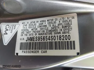 2004 Honda Civic Hybrid with VIN JHMES95654S018200, listed as a IAAI auction lot 41912912 with 291,301 mi miles. Bid and sale history available at carsss.com. Image 9.