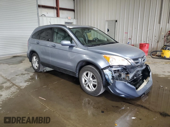2011 Honda CR-V EX-L z VIN JHLRE4H74BC013467, wystawiony jako Copart lot #56919305 z przebiegiem 166 617 mil mil oraz Szkoda całkowita • Salvage title. Historia ofert i sprzedaży dostępna na DreamBid. Obrazek 4.