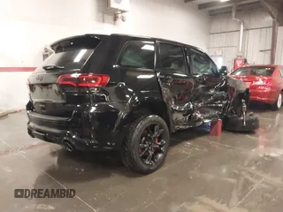 2017 Jeep Grand Cherokee SRT with VIN 1C4RJFDJ9HC739324, listed as a IAAI auction lot 40898998 with 92,547 mi miles. Bid and sale history available at carsss.com. Image 4.