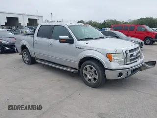 2012 Ford F-150 XL with VIN 1FTFW1CT2CKD51232, listed as a IAAI auction lot 41497343 with 300,216 mi miles. Bid and sale history available at carsss.com. Image 1.