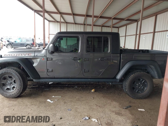 2022 Jeep Gladiator Mojave z VIN 1C6JJTEG8NL182360, wystawiony jako IAAI lot #42194516 z przebiegiem 67 658 mil mil oraz . Historia ofert i sprzedaży dostępna na DreamBid. Obrazek 14.