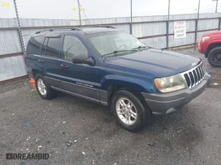 2002 Jeep Grand Cherokee Laredo with VIN 1J4GW48S22C244433, listed as a IAAI auction lot 41892912 with 256,393 mi miles. Bid and sale history available at carsss.com. Image 1.