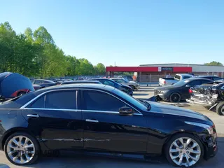 2015 Cadillac CTS Premium AWD with VIN 1G6AZ5S35F0129572, listed as a IAAI auction lot 42045670 with 62,758 mi miles and . Bid and sale history available at DreamBid. Image 13.