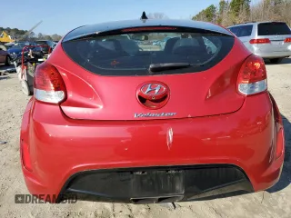 2014 Hyundai Veloster z VIN KMHTC6AD3EU217143, wystawiony jako Copart lot #43716395 z przebiegiem 137 865 mil mil oraz Szkoda całkowita • Salvage title. Historia ofert i sprzedaży dostępna na DreamBid. Obrazek 6.