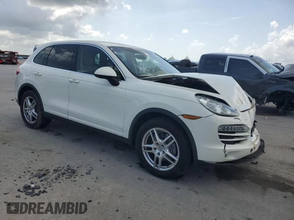 2012 Porsche Cayenne with VIN WP1AA2A23CLA02615, listed as a Copart auction lot 64604655 with 131,536 mi miles and Salvage title. Bid and sale history available at DreamBid. Image 4.