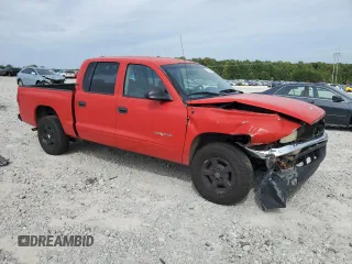 2001 Dodge Dakota Sport with VIN 1B7GL2AX51S193278, listed as a Copart auction lot 70592784 with 252,944 mi miles and Salvage Title. Bid and sale history available at carsss.com. Image 4.