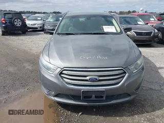 2014 Ford Taurus SE z VIN 1FAHP2D88EG143275, wystawiony jako IAAI lot #41801787 z przebiegiem 150 988 mil mil oraz . Historia ofert i sprzedaży dostępna na DreamBid. Obrazek 13.