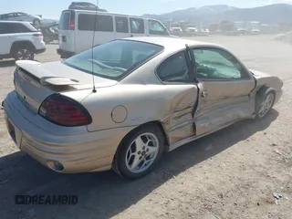 2001 Pontiac Grand Am z VIN 1G2NF12T51M534918, wystawiony jako IAAI lot #42055289 z przebiegiem 128 155 mil mil oraz . Historia ofert i sprzedaży dostępna na DreamBid. Obrazek 4.