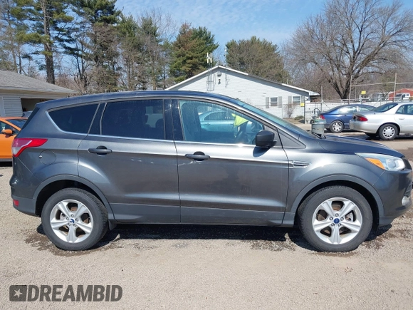 2015 Ford Escape SE with VIN 1FMCU9GX1FUC19376, listed as a IAAI auction lot 41769390 with 98,334 mi miles. Bid and sale history available at carsss.com. Image 13.