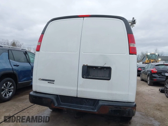 2015 Chevrolet Express Cargo Van with VIN 1GCWGFCFXF1259591, listed as a IAAI auction lot 42029679 with 144,023 mi miles. Bid and sale history available at carsss.com. Image 16.