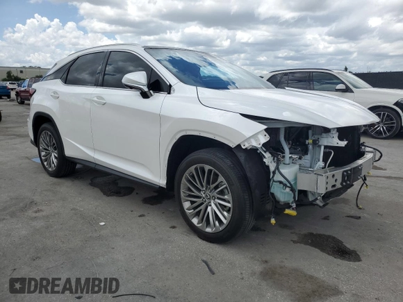 2021 Lexus RX 350 with VIN 2T2JZMDA5MC299559, listed as a Copart auction lot 60450495 with 24,390 mi miles and Salvage title. Bid and sale history available at DreamBid. Image 4.