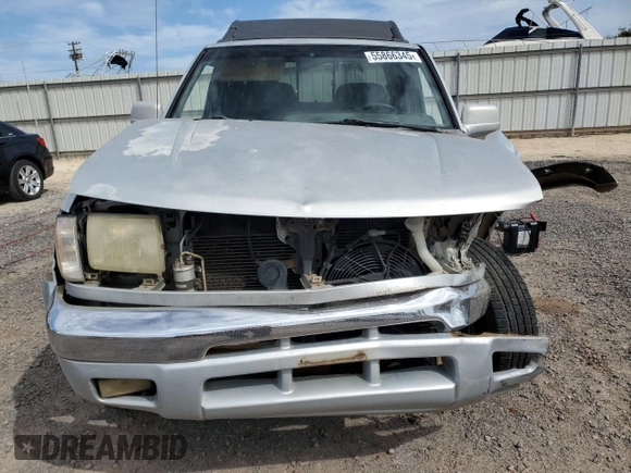 2000 Nissan Frontier XE with VIN 1N6ED27T8YC367452, listed as a Copart auction lot 55866345 with 242,945 mi miles and Salvage title. Bid and sale history available at DreamBid. Image 5.