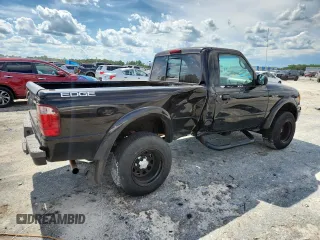 2004 Ford Ranger XL with VIN 1FTYR10U24TA20272, listed as a Copart auction lot 63594485 with 187,837 mi miles and Salvage title. Bid and sale history available at DreamBid. Image 3.