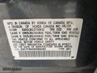 2004 Honda Pilot EX with VIN 2HKYF18414H589485, listed as a IAAI auction lot 42100822 with 172,254 mi miles. Bid and sale history available at carsss.com. Image 9.