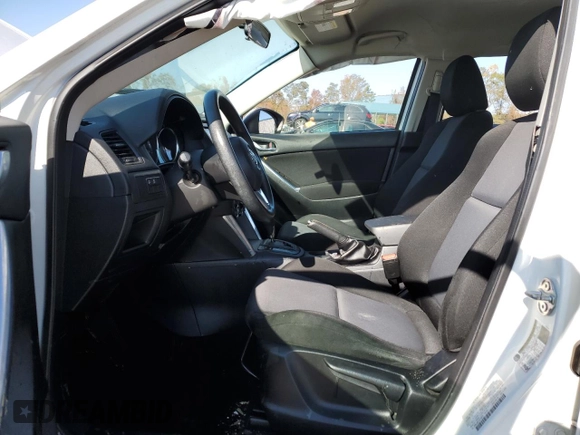 2013 Mazda CX-5 Sport z VIN JM3KE4BEXD0158031, wystawiony jako Copart lot #77827644 z przebiegiem Nie podano mil oraz Szkoda całkowita • Salvage title. Historia ofert i sprzedaży dostępna na DreamBid. Obrazek 7.