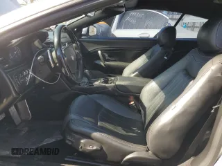 2011 Maserati GranTurismo Convertible with VIN ZAM45KMA8B0055179, listed as a Copart auction lot 77372874 with 31,203 mi miles and Salvage Title. Bid and sale history available at carsss.com. Image 7.