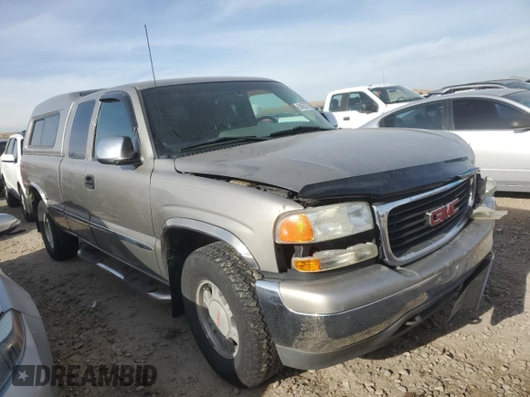 2000 GMC New Sierra 1500 SLE with VIN 2GTEK19T7Y1310097, listed as a Copart auction lot 84557764 with 257,060 mi miles and Salvage Title. Bid and sale history available at carsss.com. Image 4.
