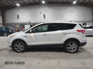 2016 Ford Escape Titanium with VIN 1FMCU9J95GUB02377, listed as a IAAI auction lot 41869557 with 88,441 mi miles. Bid and sale history available at carsss.com. Image 14.