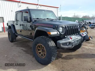 2023 Jeep Gladiator Rubicon z VIN 1C6JJTBG6PL530289, wystawiony jako IAAI lot #41719699 z przebiegiem 23 245 mil mil oraz . Historia ofert i sprzedaży dostępna na DreamBid. Obrazek 1.