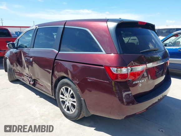 2011 Honda Odyssey EX-L with VIN 5FNRL5H60BB094647, listed as a IAAI auction lot 42223712 with 202,612 mi miles and . Bid and sale history available at carsss.com. Image 3.