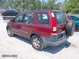 2005 Honda CR-V LX with VIN SHSRD68535U303838, listed as a IAAI auction lot 42032721 with 167,721 mi miles. Bid and sale history available at carsss.com. Image 3.