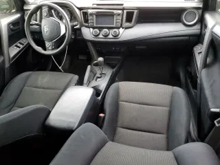 2014 Toyota RAV4 LE with VIN JTMZFREV6ED041246, listed as a Copart auction lot 55559075 with 129,515 mi miles and Salvage title. Bid and sale history available at DreamBid. Image 8.