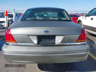2002 Ford Crown Victoria Police Police Interceptor with VIN 2FAFP71W52X143053, listed as a IAAI auction lot 41594827 with 210,078 mi miles. Bid and sale history available at carsss.com. Image 16.