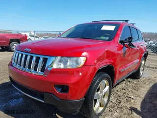 2011 Jeep Grand Cherokee Overland with VIN 1J4RR6GT7BC551649, listed as a IAAI auction lot 41897267 with 82,034 mi miles. Bid and sale history available at carsss.com. Image 18.