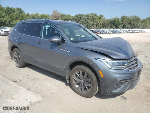 2023 Volkswagen Tiguan SE with VIN 3VVMB7AX5PM003548, listed as a Copart auction lot 71401574 with NaN miles and Salvage Title. Bid and sale history available at carsss.com. Image 4.