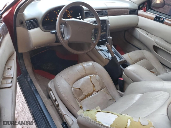 1994 Lexus SC 400 with VIN JT8UZ30C7R0038257, listed as a Copart auction lot 46889845 with 243,576 mi miles and Salvage Title. Bid and sale history available at carsss.com. Image 8.