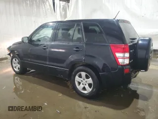 2011 Suzuki Grand Vitara Premium with VIN JS3TD0D28B4102673, listed as a Copart auction lot 43216005 with 141,726 mi miles and Salvage title. Bid and sale history available at DreamBid. Image 2.