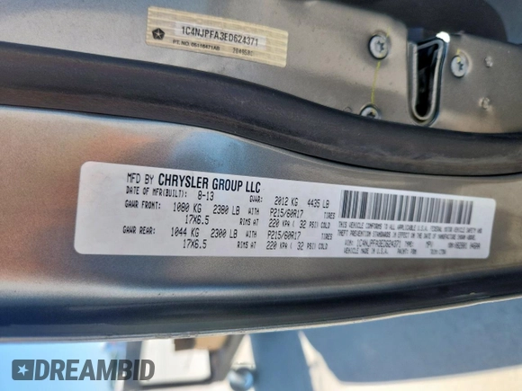 2014 Jeep Patriot High Altitude z VIN 1C4NJPFA3ED624371, wystawiony jako Copart lot #61250965 z przebiegiem 169 148 mil mil oraz Szkoda całkowita • Salvage title. Historia ofert i sprzedaży dostępna na DreamBid. Obrazek 13.